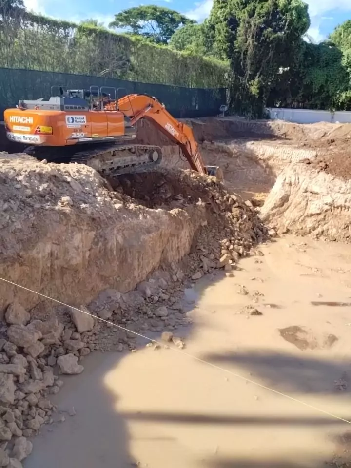 Excavating for a basement in hard pan rock