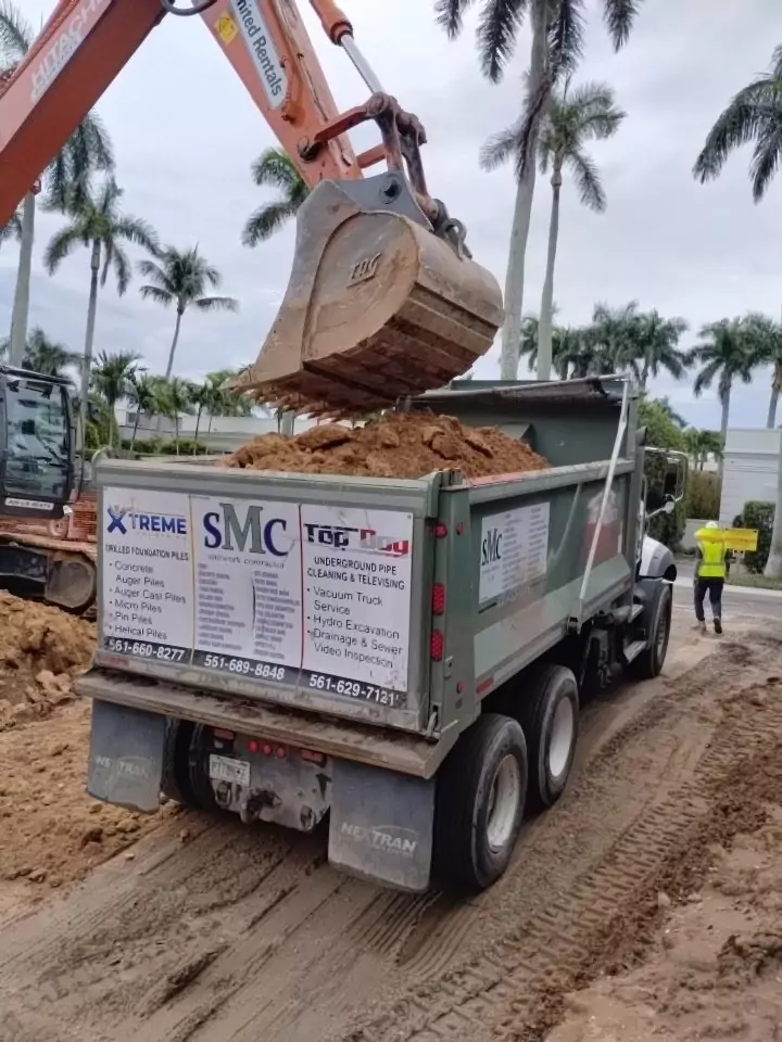 hauling hard rock excavation palm beach